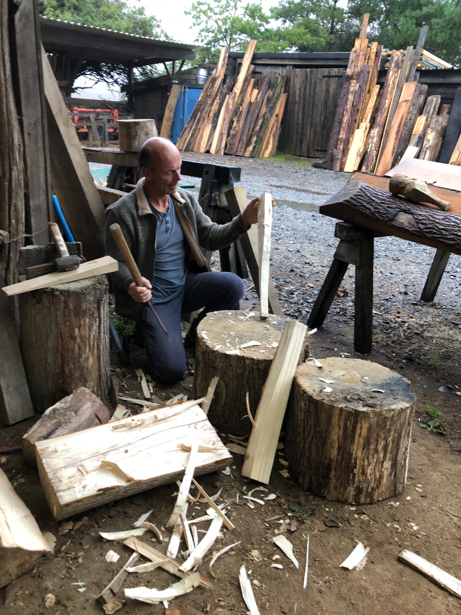 Pierre Woodward working timber at the Silverback wood yard