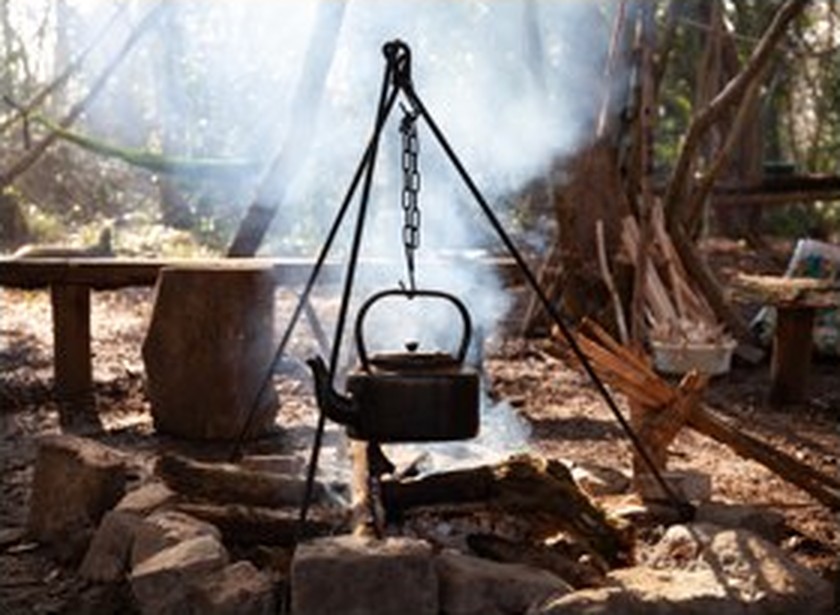 Cooking and learning around a woodland fire